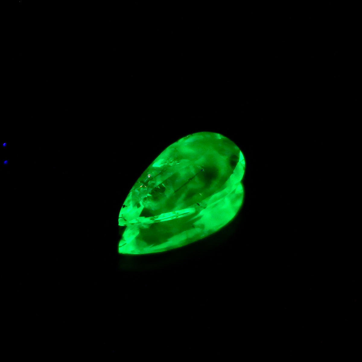 Natural Daylight Fluorescent Hyalite Opal 0.53 Carat 9.4x5 MM Pear Shape Faceted Gemstone