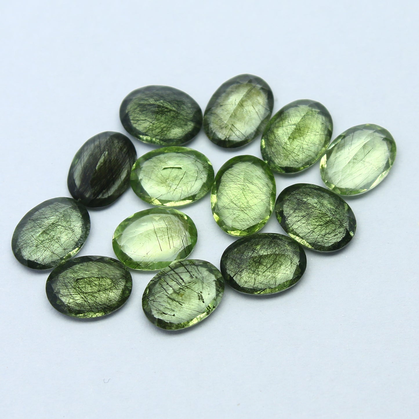 Natural Ludwigite Needles in Peridot Lot 6x4 to 10x7 MM Oval Shape Faceted Rutile Peridot Gemstone Lot
