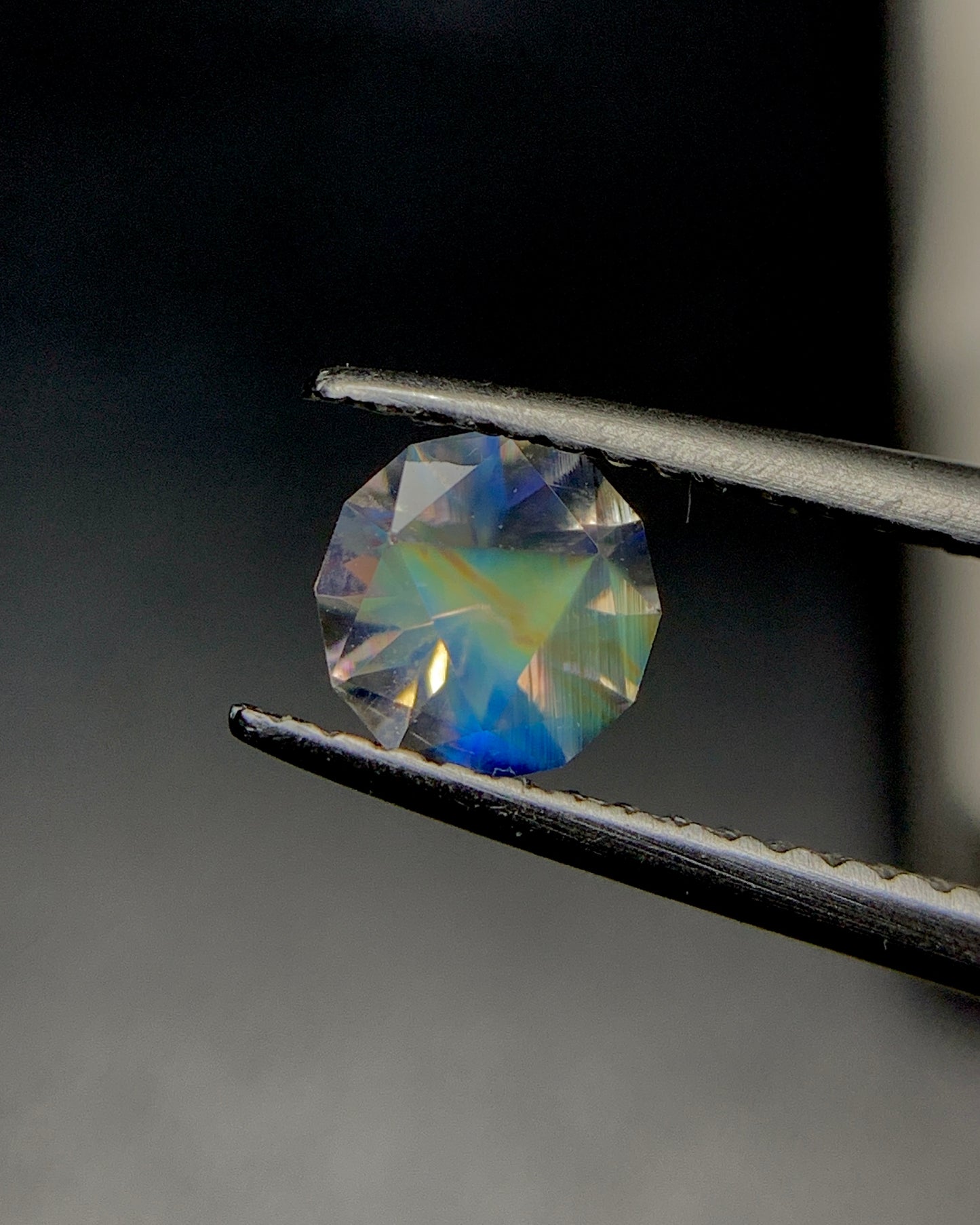 Natural Multi Fire Rainbow Moonstone 0.52 Carat 5.5x5.5 MM Corner Cut Faceted Gemstone