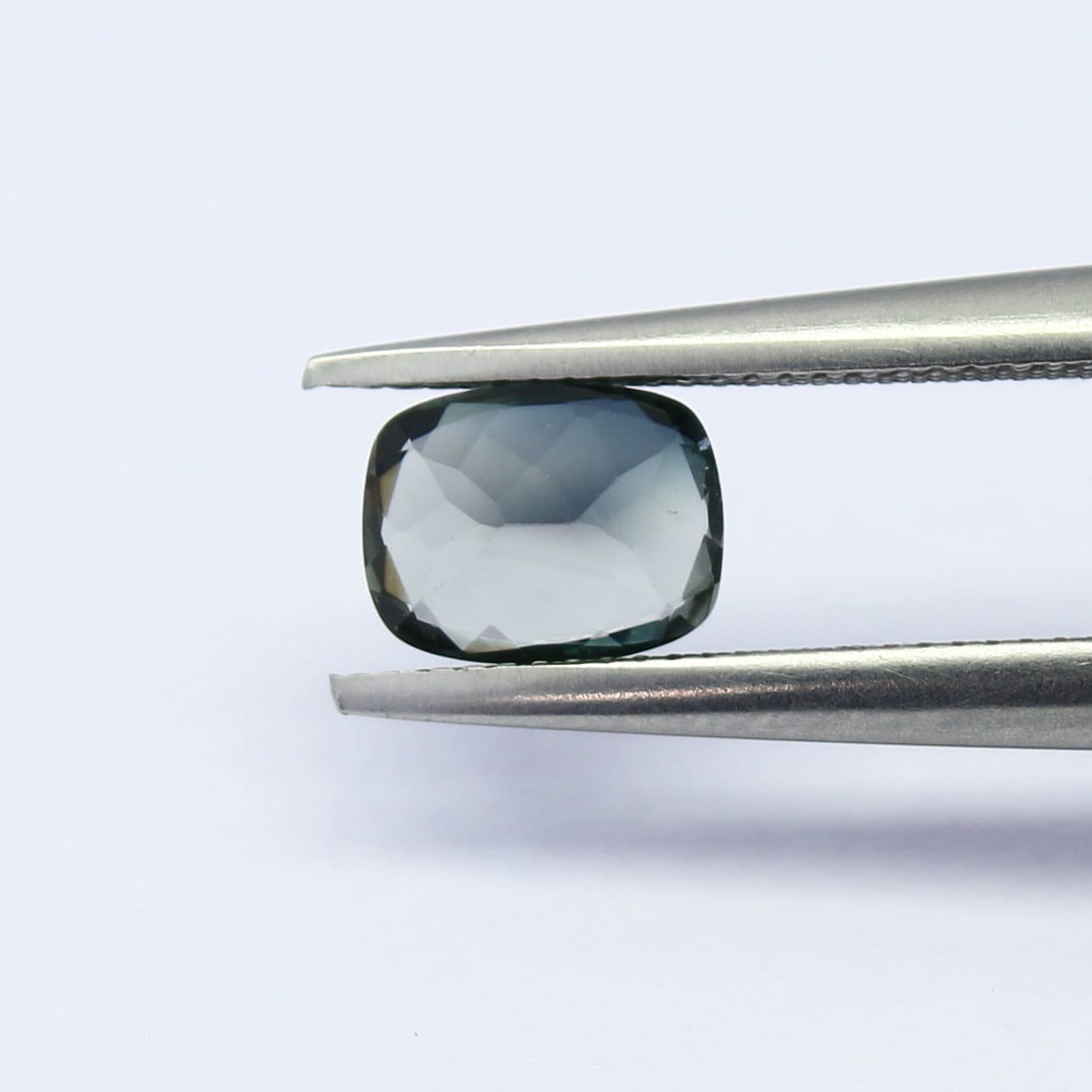 Natural Bi-Color Tourmaline 0.72 Carat 6.2x4.8 MM Cushion Shape Faceted Gemstone