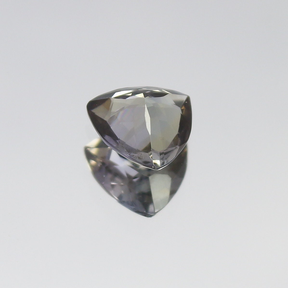 Natural Unheated Bi-Color Tanzanite 0.57 Carat 5.8x5.8 MM Trillion Shape Faceted Gemstone