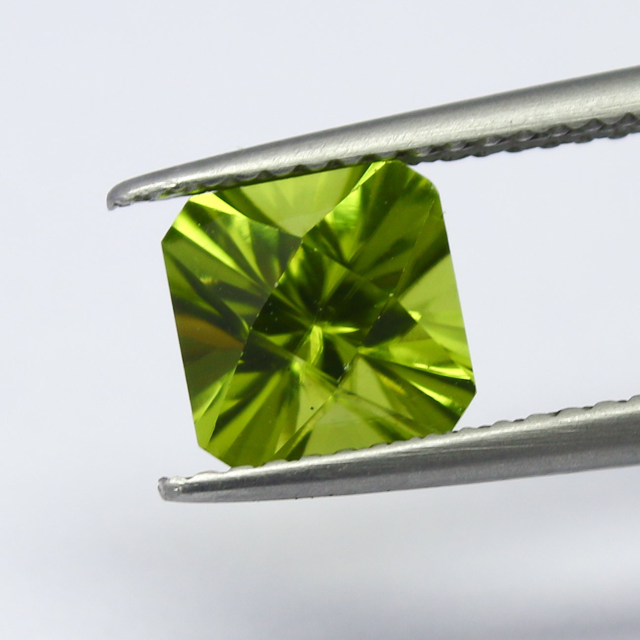 Natural Peridot 1.82 Carat 6.9x6.9 MM Concave Cut Faceted Gemstone
