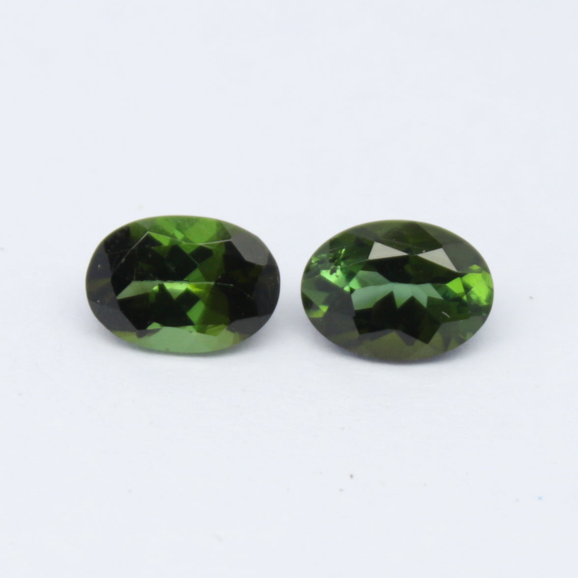 Natural Green Tourmaline Pair 1.61 Carat 7x5 MM Oval Shape Faceted Gemstone Pair