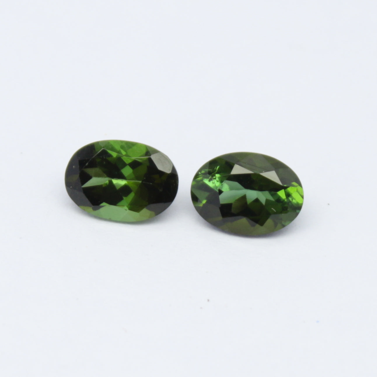 Natural Green Tourmaline Pair 1.61 Carat 7x5 MM Oval Shape Faceted Gemstone Pair