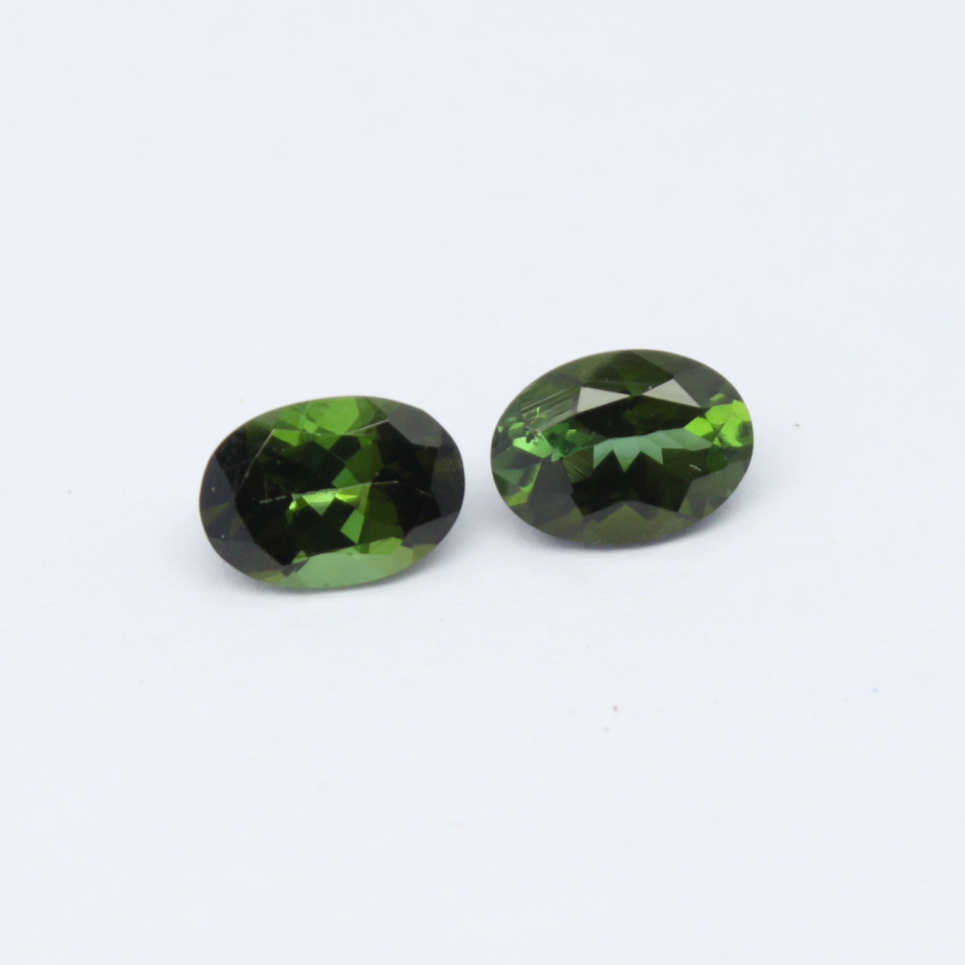 Natural Green Tourmaline Pair 1.61 Carat 7x5 MM Oval Shape Faceted Gemstone Pair