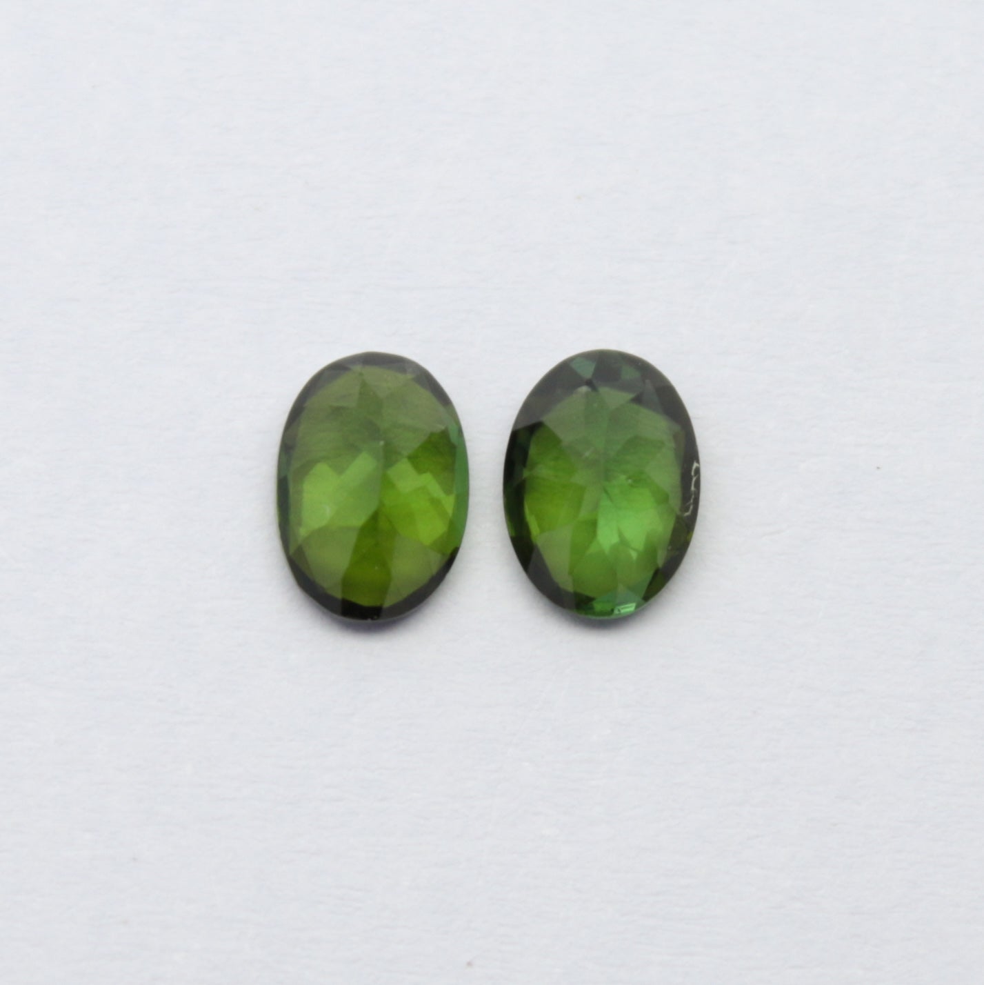 Natural Green Tourmaline Pair 1.61 Carat 7x5 MM Oval Shape Faceted Gemstone Pair