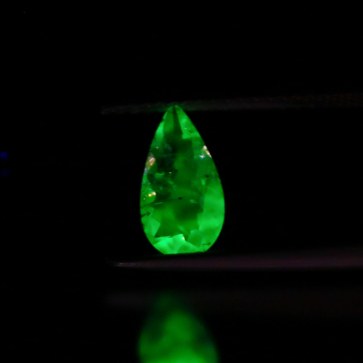 Natural Daylight Fluorescent Hyalite Opal 0.53 Carat 9.4x5 MM Pear Shape Faceted Gemstone