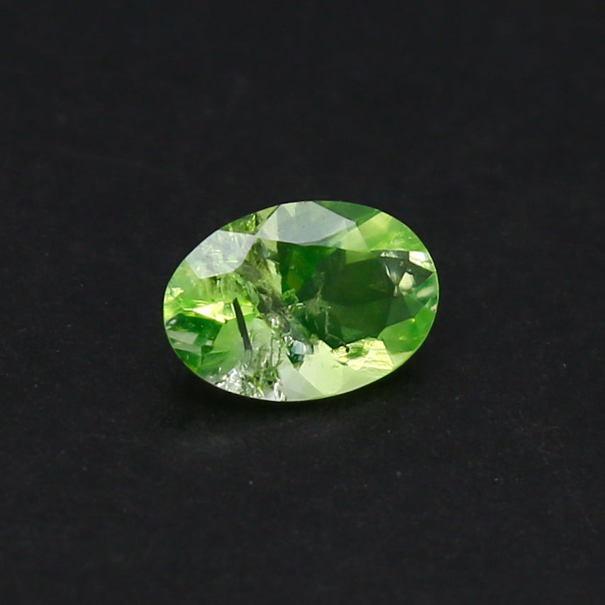 Natural Daylight Fluorescent Hyalite Opal 0.41 Carat 5.6x3.9 MM Oval Shape Faceted Gemstone