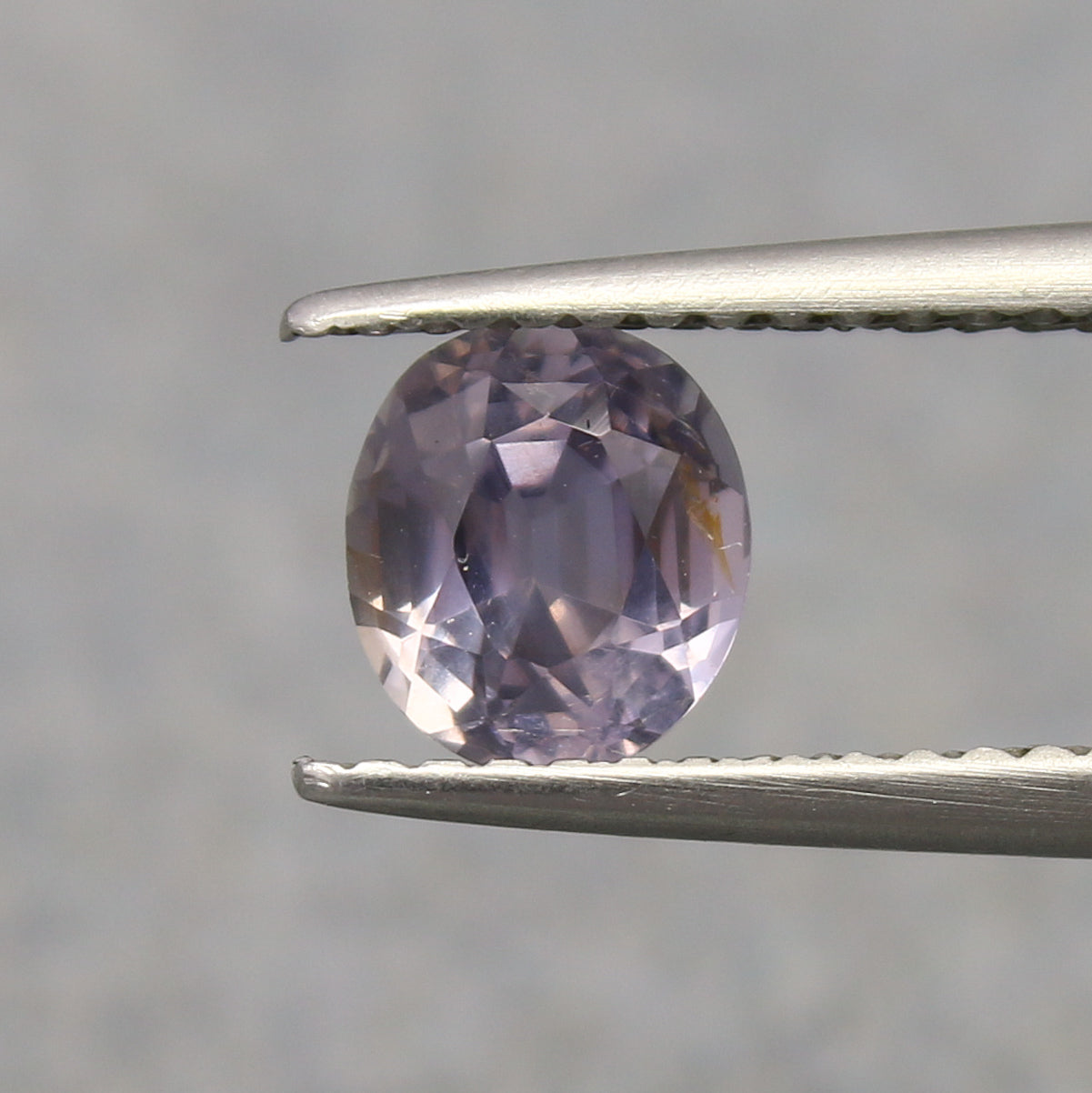 Natural Color Change Sapphire 1.03 Carat 6.2x5.5 MM Oval Shape Faceted Gemstone