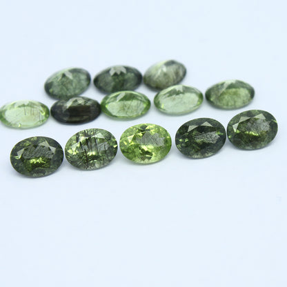 Natural Ludwigite Needles in Peridot Lot 6x4 to 10x7 MM Oval Shape Faceted Rutile Peridot Gemstone Lot