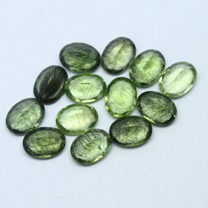 Natural Ludwigite Needles in Peridot Lot 6x4 to 10x7 MM Oval Shape Faceted Rutile Peridot Gemstone Lot