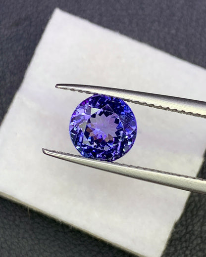 Natural Bi Color Tanzanite 1.94 Carat 7.6x7.6 MM Round Shape Faceted Gemstone