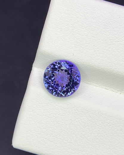 Natural Bi Color Tanzanite 1.94 Carat 7.6x7.6 MM Round Shape Faceted Gemstone