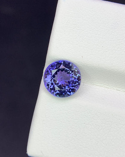 Natural Bi Color Tanzanite 1.94 Carat 7.6x7.6 MM Round Shape Faceted Gemstone