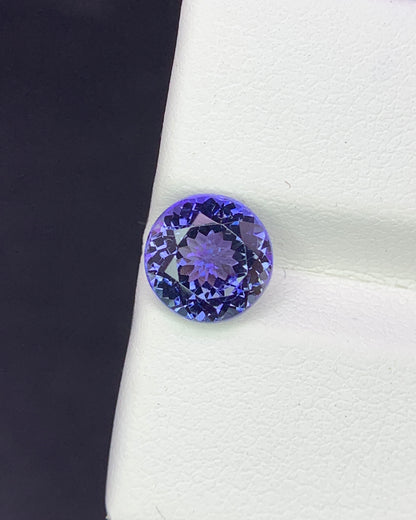 Natural Bi Color Tanzanite 1.94 Carat 7.6x7.6 MM Round Shape Faceted Gemstone