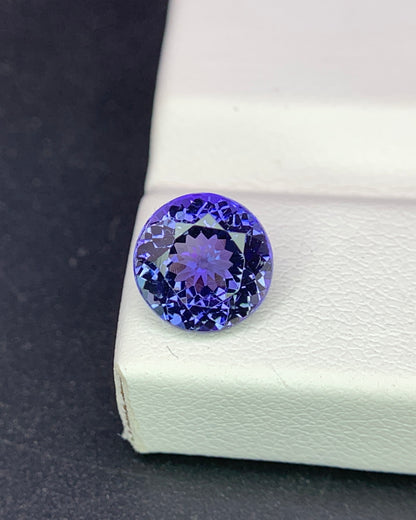 Natural Bi Color Tanzanite 1.94 Carat 7.6x7.6 MM Round Shape Faceted Gemstone