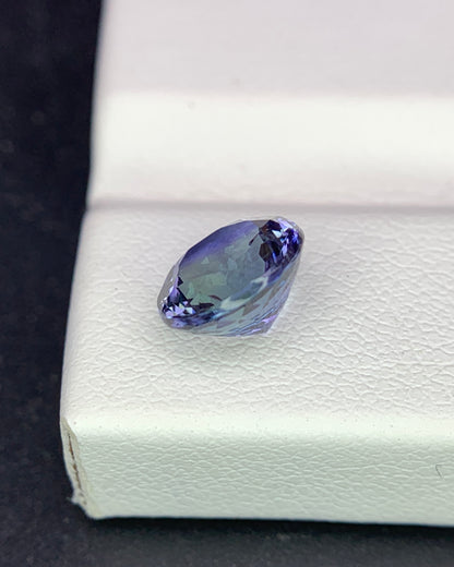 Natural Bi Color Tanzanite 1.94 Carat 7.6x7.6 MM Round Shape Faceted Gemstone