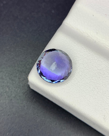 Natural Bi Color Tanzanite 1.94 Carat 7.6x7.6 MM Round Shape Faceted Gemstone