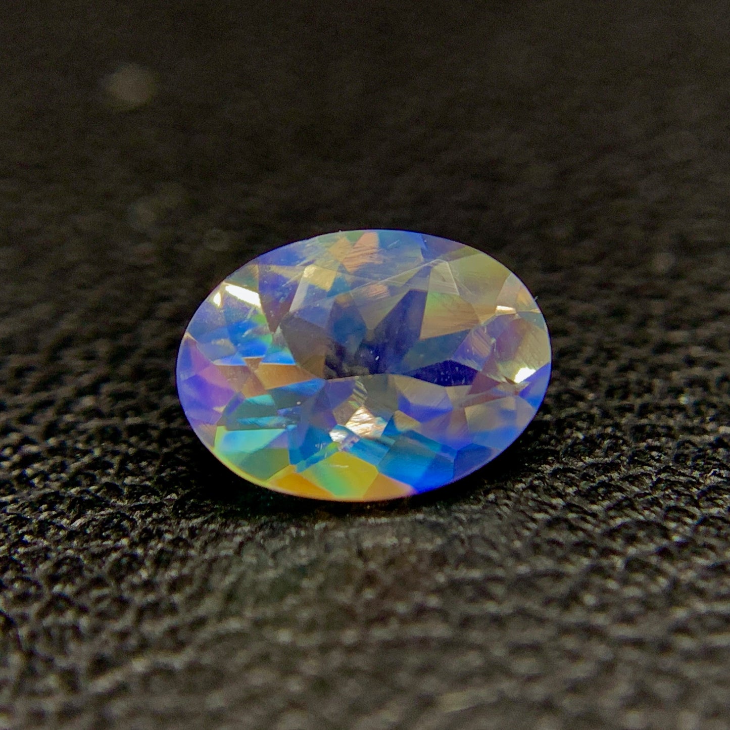 Natural Multi-Fire Rainbow Moonstone 0.71 Carat 7x5 MM Oval Shape Faceted Gemstone