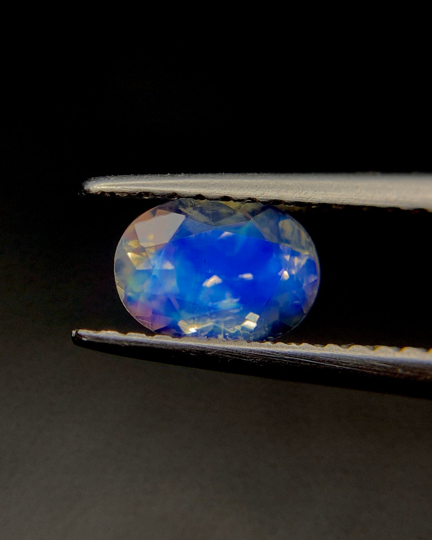 Natural Blue Fire Rainbow Moonstone 0.76 Carat 6.8x5 MM Oval Shape Faceted Gemstone from Madagascar
