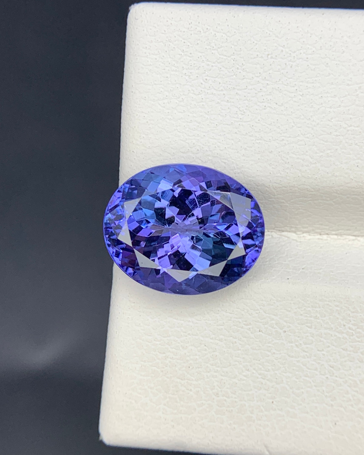 Natural Bi Color Tanzanite 5.21 Carat 12x9.7 MM Oval Shape Faceted Gemstone