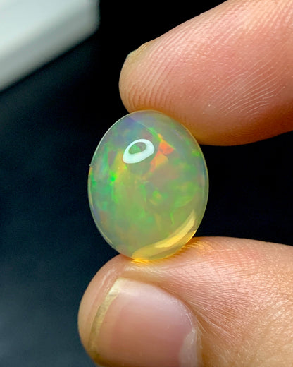 Natural Mexican Fire Opal 7.52 Carat 14.1x11.2 MM Oval Shape Cabochon Gemstone 