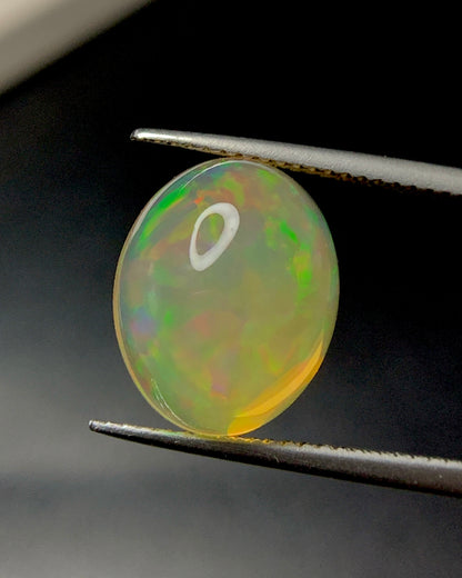 Natural Mexican Fire Opal 7.52 Carat 14.1x11.2 MM Oval Shape Cabochon Gemstone 