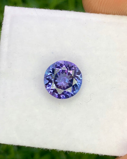 Natural Bi Color Tanzanite 1.31 Carat 6.9x6.9 MM Round Shape Faceted Gemstone