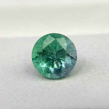 Natural Rare Kornerupine 0.68 Carat 5.4x5.4 MM Round Shape Faceted Gemstone