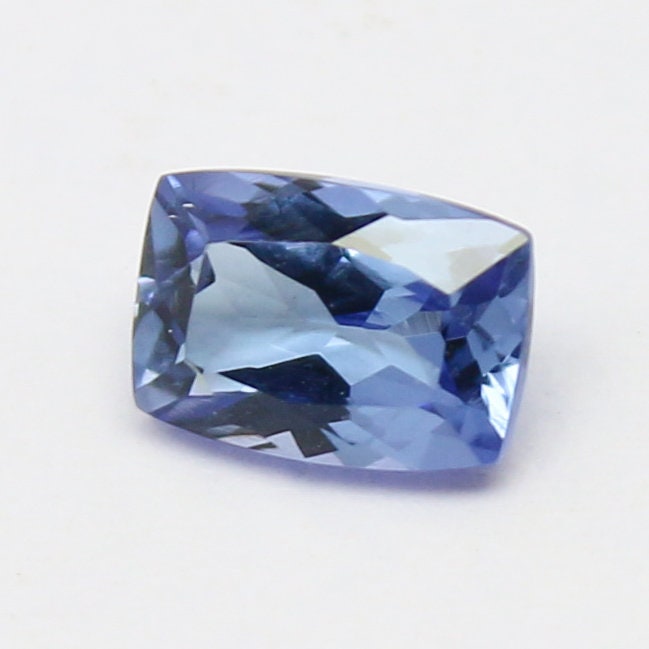 Natural VVS1 Blue Tanzanite 0.56 Carat 6x4.1 MM Cushion Shape Faceted Gemstone