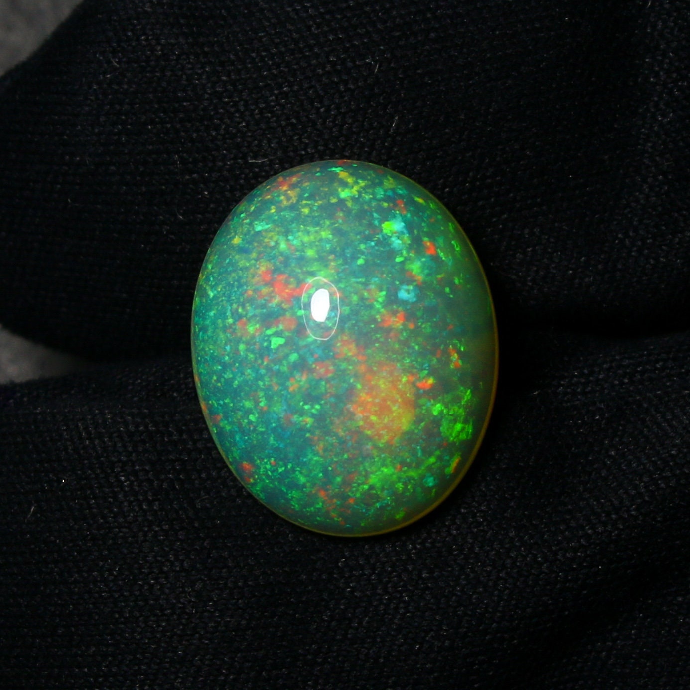 Natural Rare Ethiopian Opal 4.64 Carat 14.6x11.9 MM Oval Shape Cabochon Gemstone October Birthstone