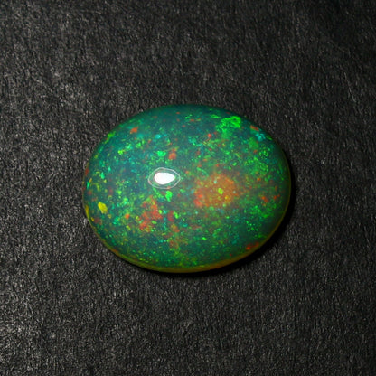 Natural Rare Ethiopian Opal 4.64 Carat 14.6x11.9 MM Oval Shape Cabochon Gemstone October Birthstone