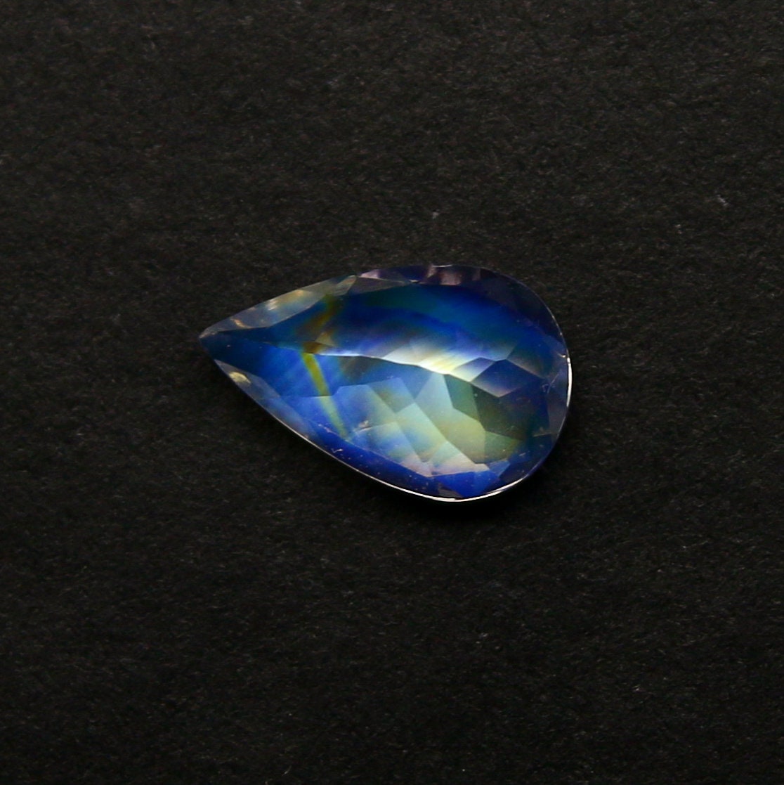 Natural Multi-Fire Rainbow Moonstone (Andesine Labradorite) 0.52 Carat 7x4.5 MM Pear Shape Faceted Gemstone