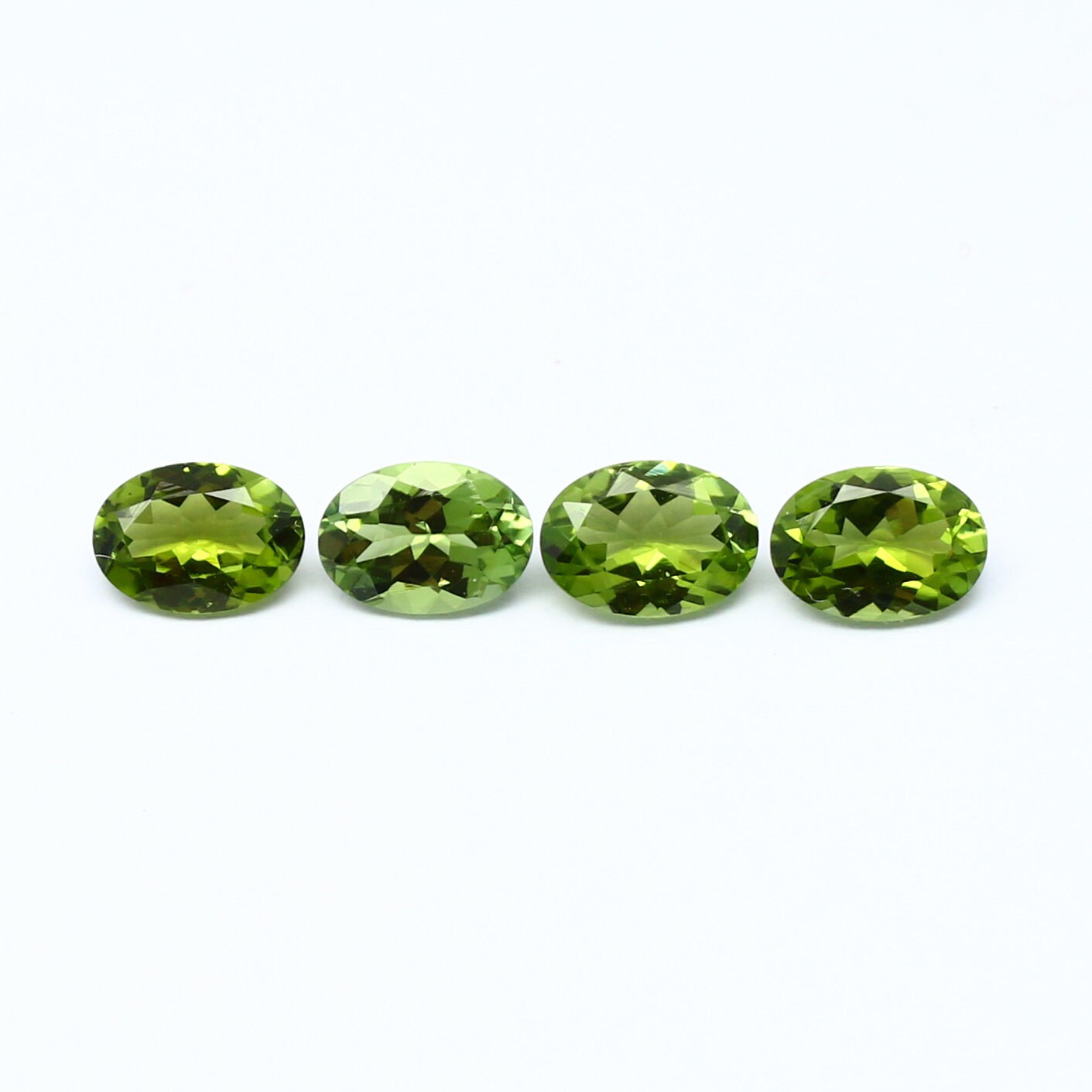 Natural Green Tourmaline lot 2.87  Carat 7x5 MM Oval Faceted Gemstone 4 Piece Lot