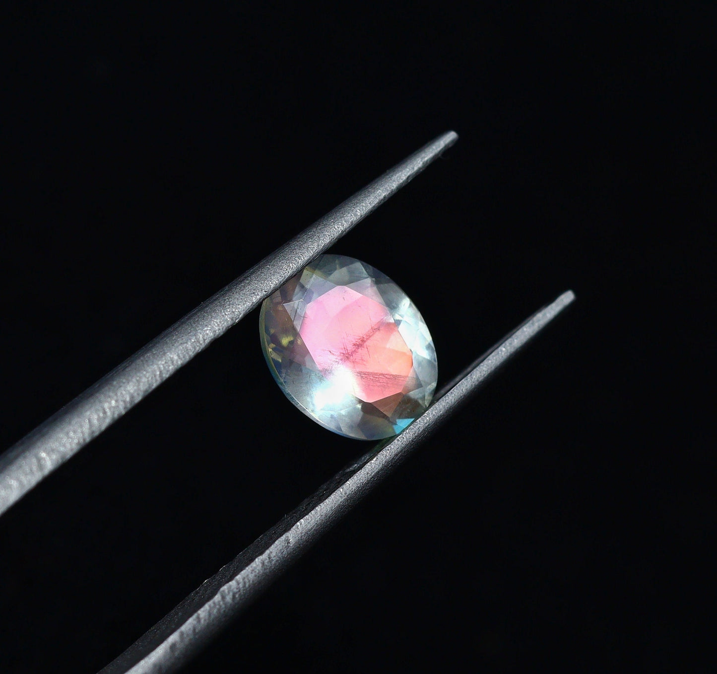 Natural Pink-Fire Rainbow Moonstone 0.78 Carat 6.8x5.4 MM Oval Shape Faceted Gemstone