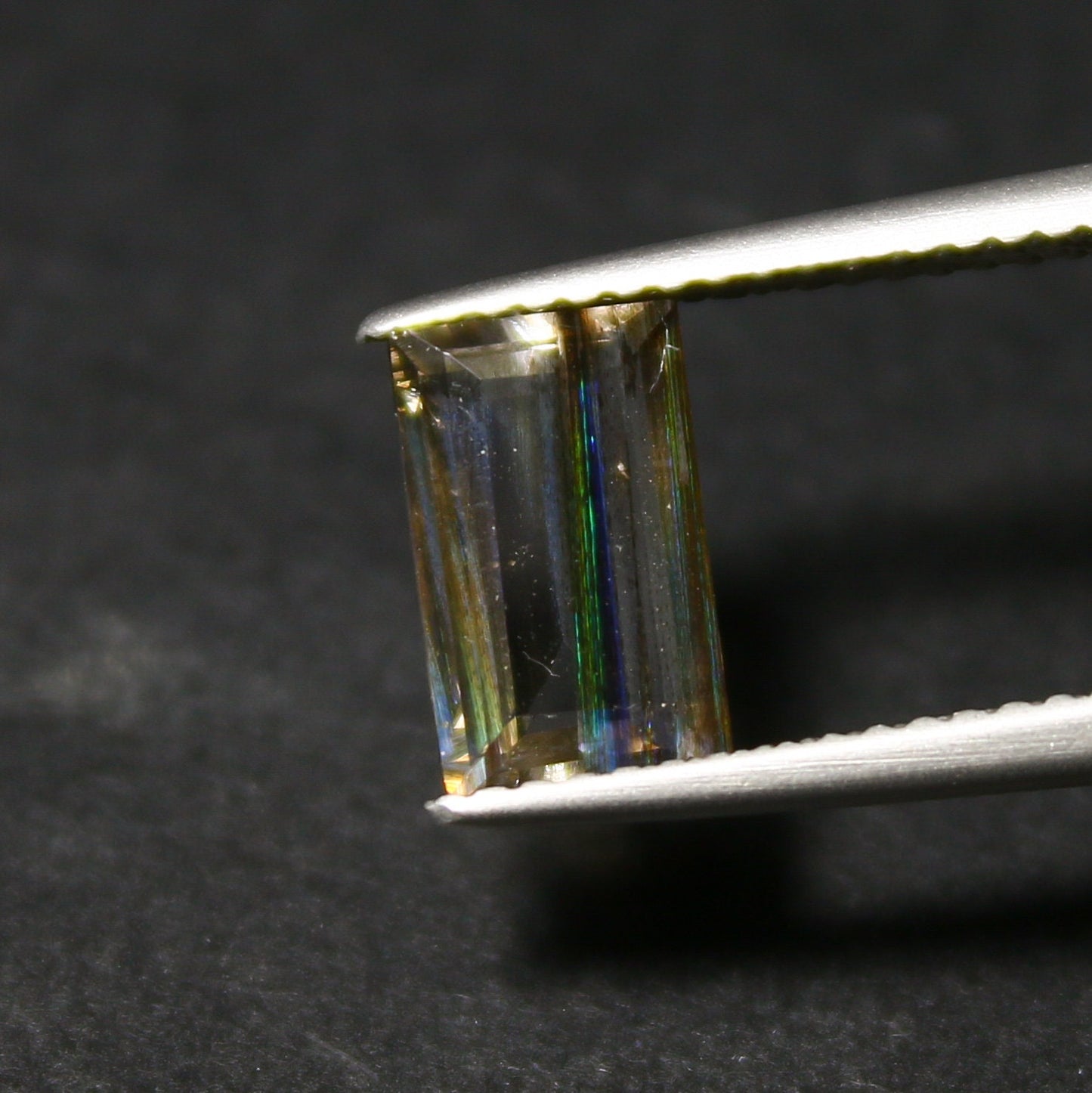 Natural Multi-Fire Rainbow Scapolite 1.14 Carat 8.8x5.5 MM Baguette Shape Faceted Gemstone