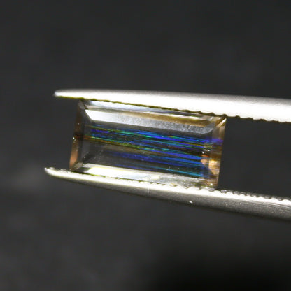 Natural Multi-Fire Rainbow Scapolite 1.22 Carat 10x5 MM Baguette Shape Faceted Gemstone