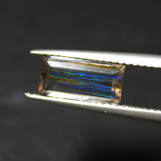 Natural Multi-Fire Rainbow Scapolite 1.22 Carat 10x5 MM Baguette Shape Faceted Gemstone