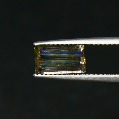 Natural Multi-Fire Rainbow Scapolite 1.47 Carat 9.5x5.5 MM Baguette Shape Faceted Gemstone