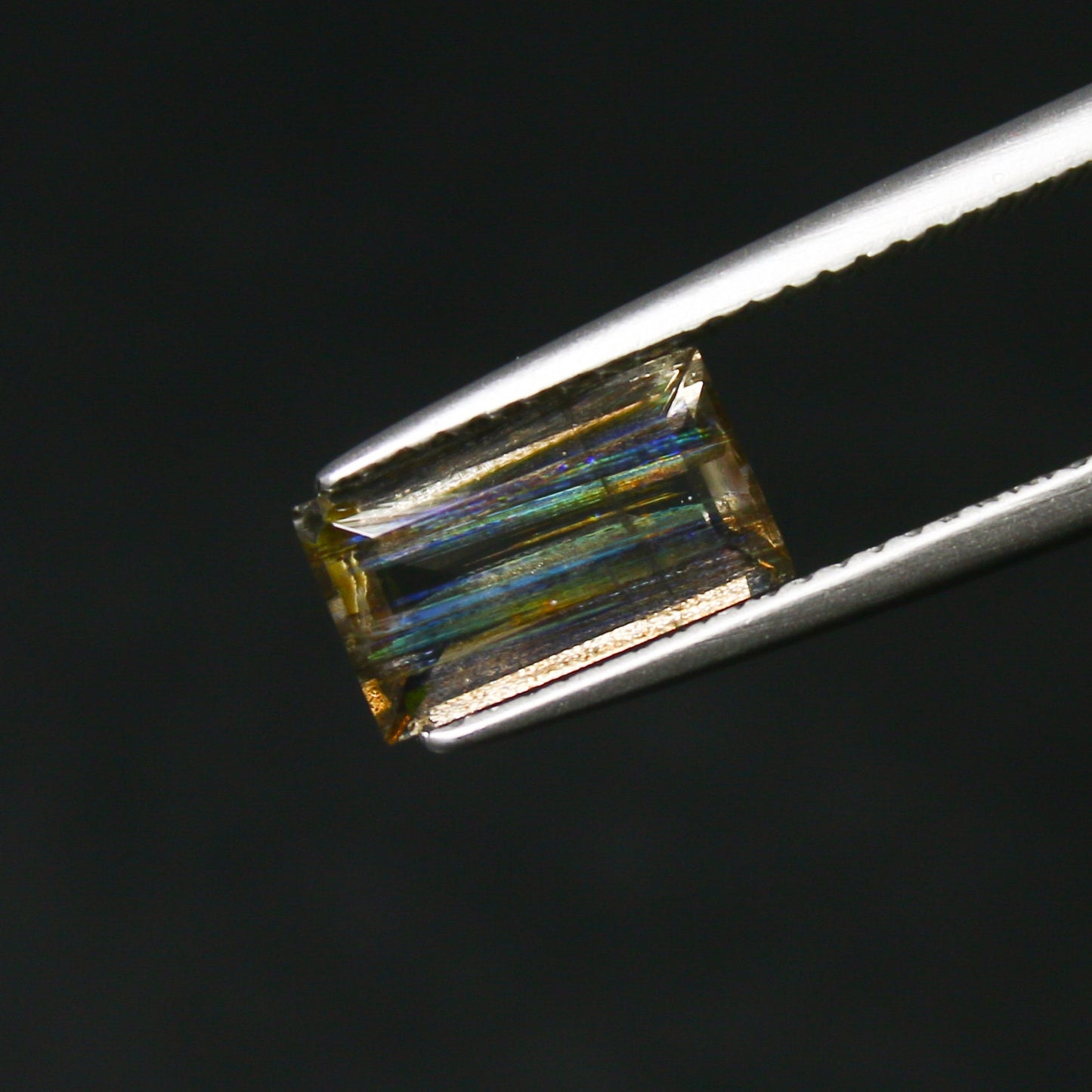 Natural Multi-Fire Rainbow Scapolite 1.47 Carat 9.5x5.5 MM Baguette Shape Faceted Gemstone