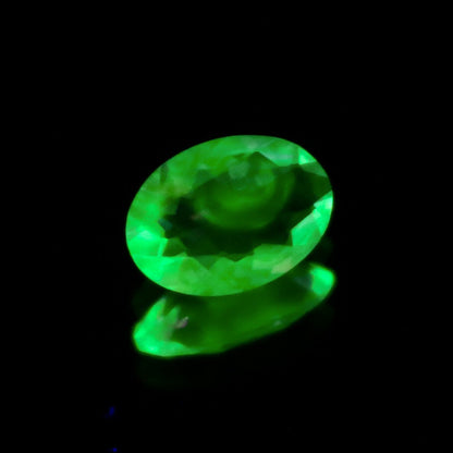 Natural Daylight Fluorescent Hyalite Opal 0.41 Carat 7x5 MM Oval Shape Faceted Gemstone