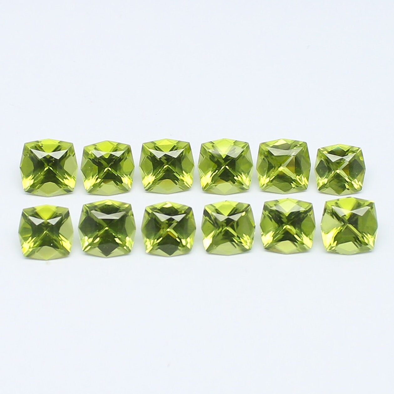 Natural Peridot Lot 18.11 Carat 7x7 MM (Approx.) Fancy Cushion Shape Faceted Gemstone 12 Piece Lot