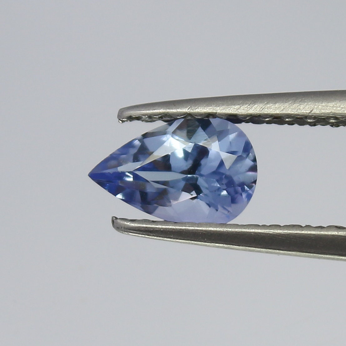 Natural Bi-Color Tanzanite 0.54 Carat 6.6x4.3 MM Pear Shape Faceted Gemstone