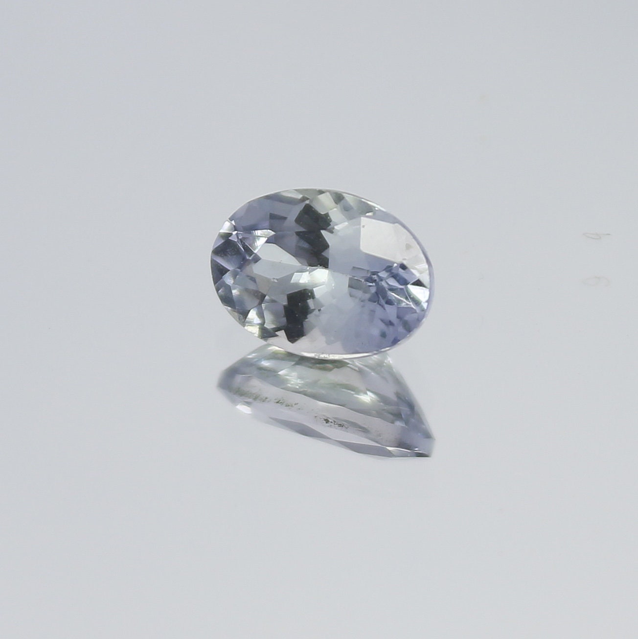 Natural Bi-Color Tanzanite 0.88 Carat 7x5 MM Oval Shape Faceted Gemstone