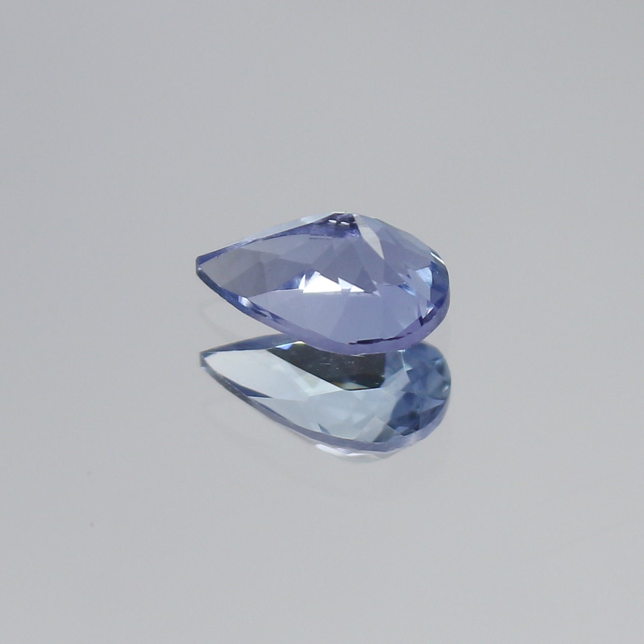 Natural Bi-Color Tanzanite 0.54 Carat 6.6x4.3 MM Pear Shape Faceted Gemstone