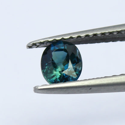 Natural Teal Blue Sapphire 0.67 Carat 5.4x4.2 MM Oval Shape Faceted Gemstone