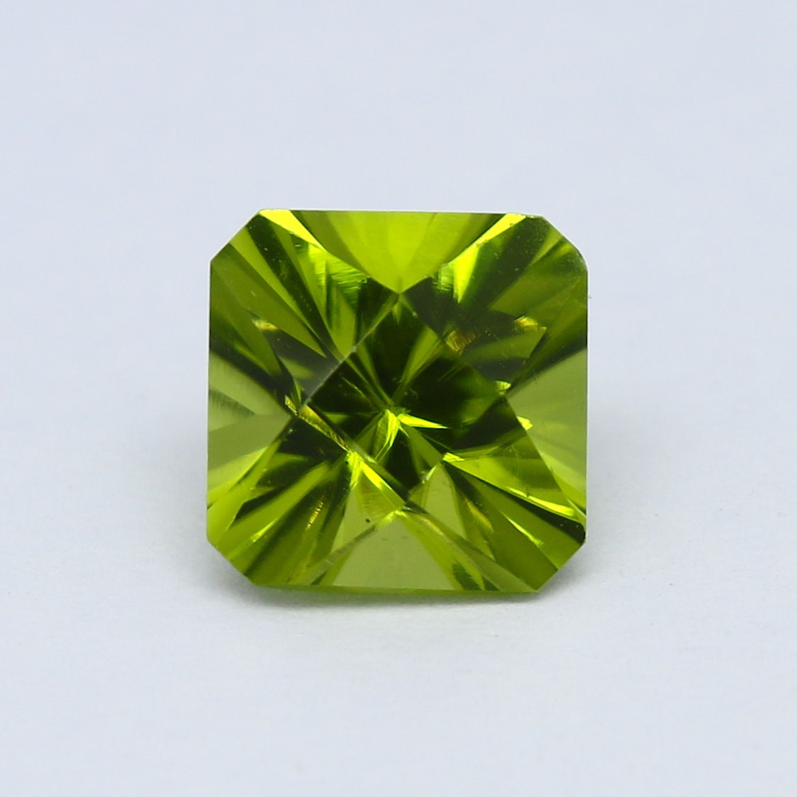 Natural Peridot 1.82 Carat 6.9x6.9 MM Concave Cut  Faceted Gemstone