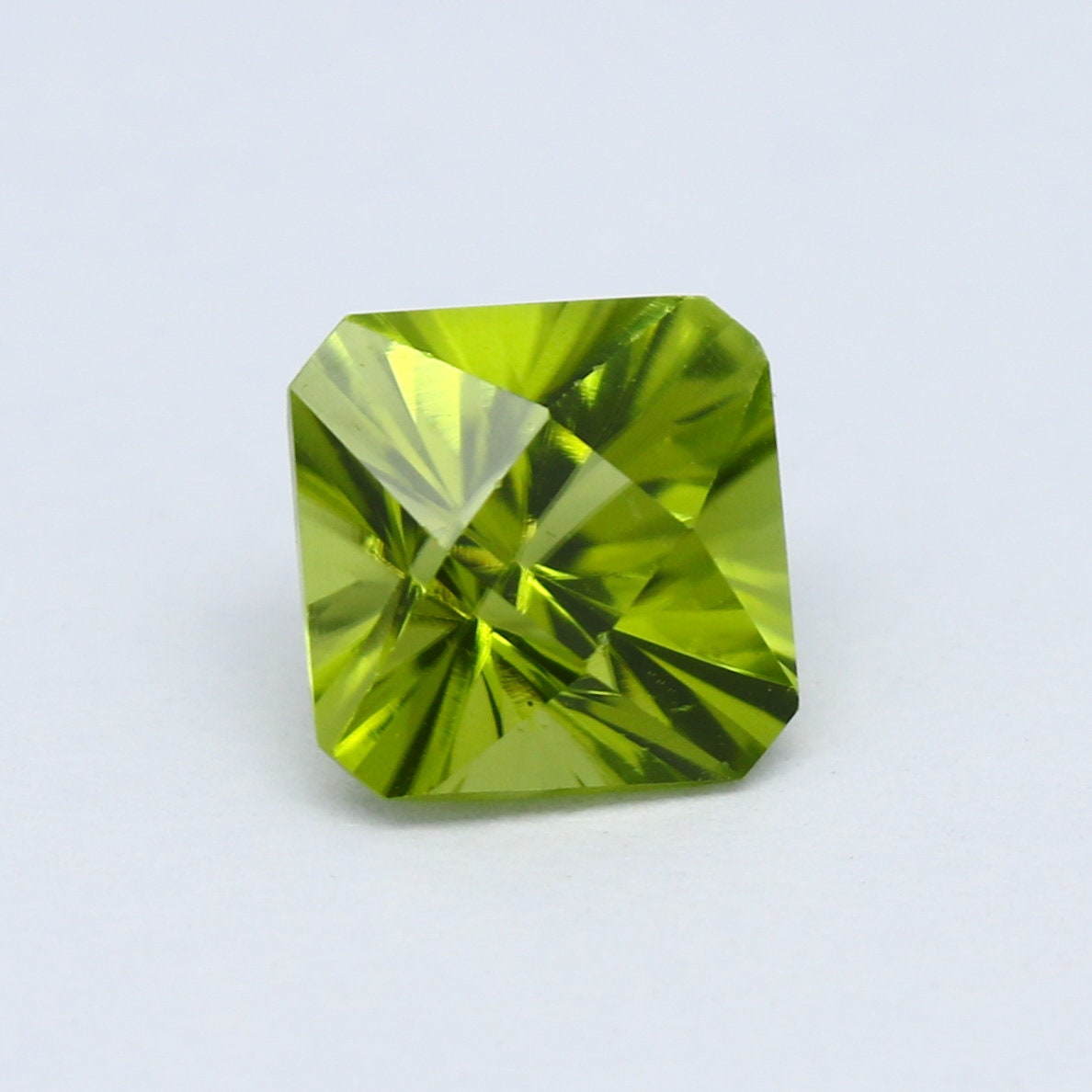 Natural Peridot 1.82 Carat 6.9x6.9 MM Concave Cut  Faceted Gemstone