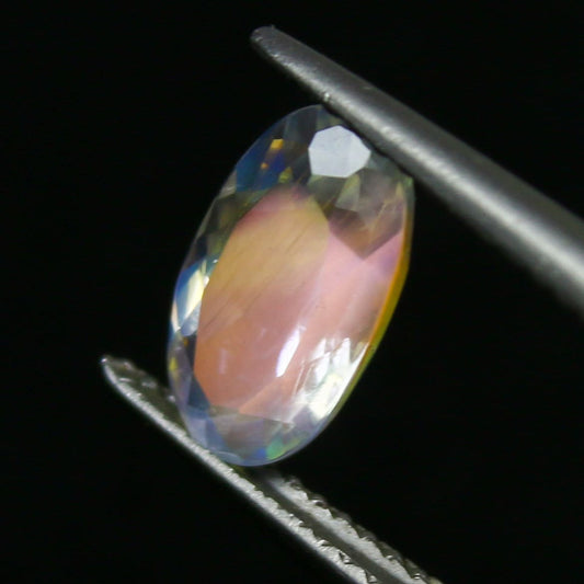 Natural Multi-Fire Rainbow Moonstone (Andesine Labradorite) 1.46 Carat 10.1x5.8 MM Oval Shape Pink and Purple Fire Faceted Gemstone