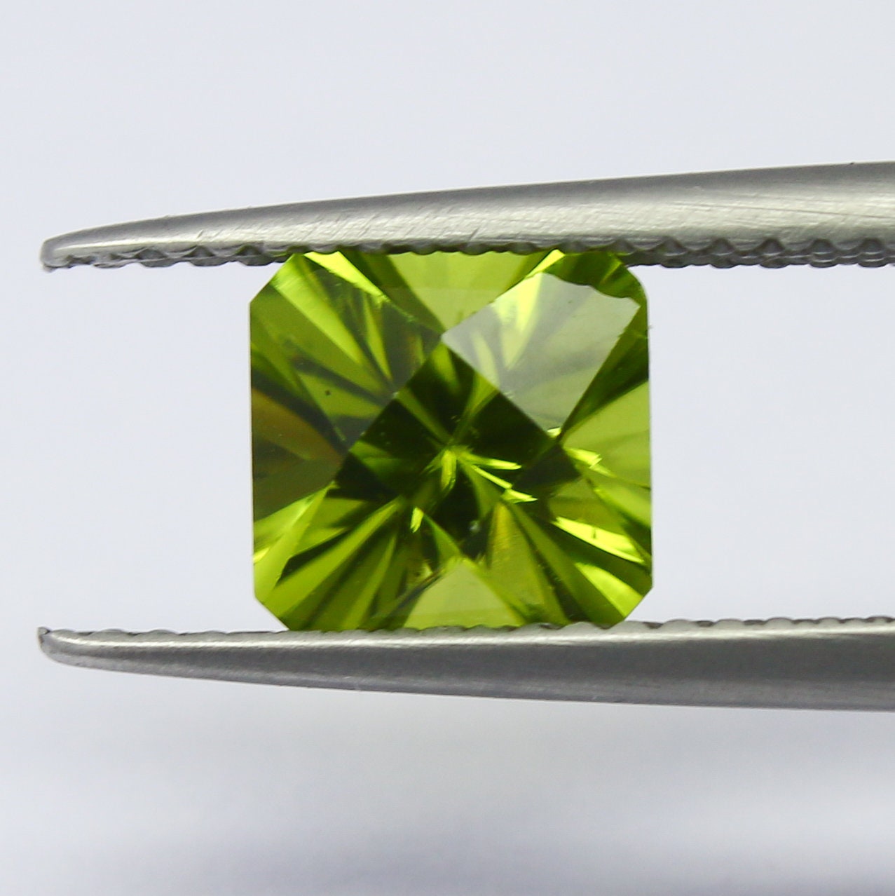 Natural Peridot 1.82 Carat 6.9x6.9 MM Concave Cut  Faceted Gemstone